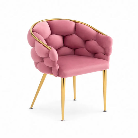 Chaise en velours rose avec pieds en métal doré